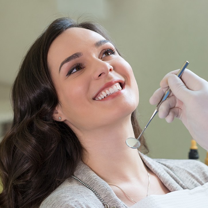 Woman smiling during dental checkup