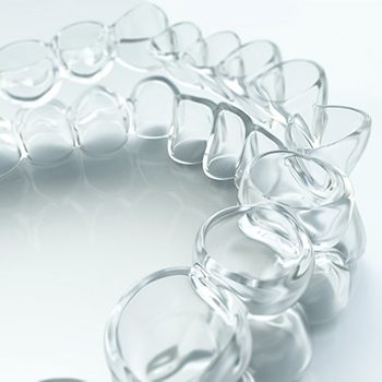 Closeup of clean, clear Invisalign in Long Beach aligners