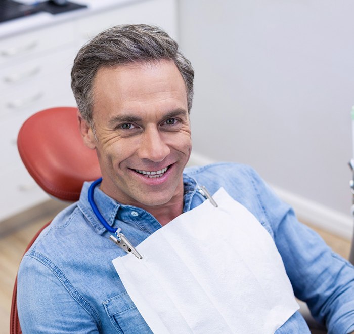 Happy patient at appointment with Ironworkers Local 580 dentist in Long Beach