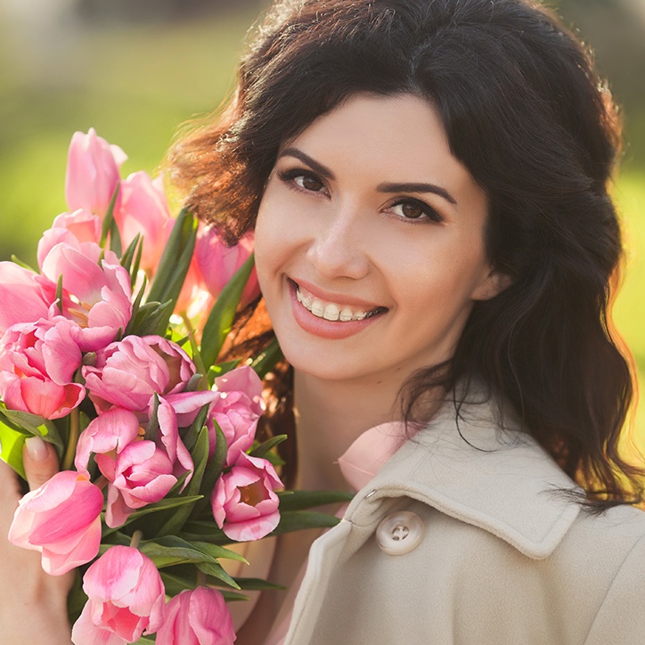 Woman with clear and ceramic braces