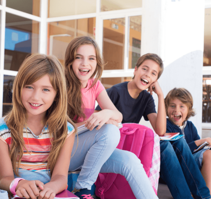 Group of kids with healthy smiles after pediatric dentistry