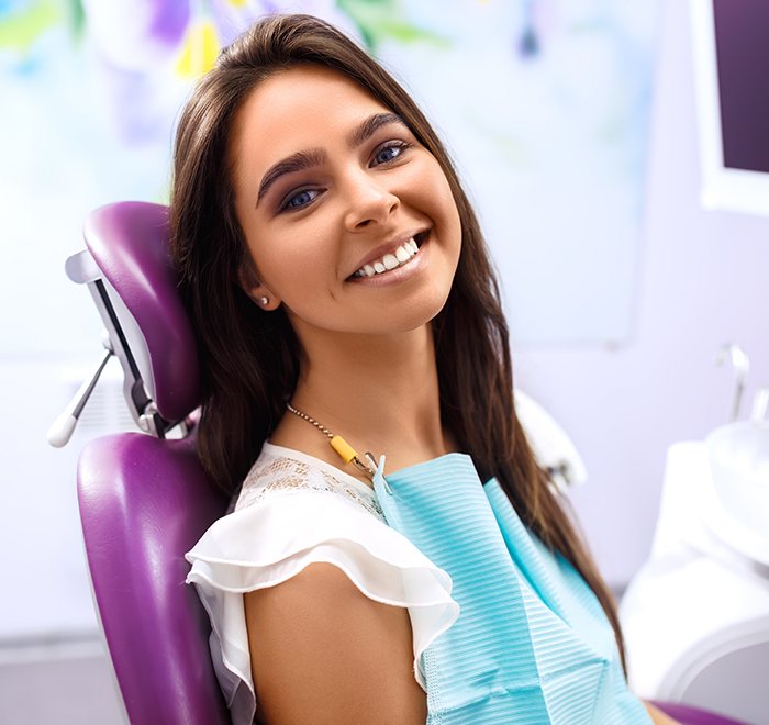 Woman with healthy smile after preventive dentistry visit
