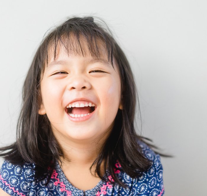  happy, smiling little girl