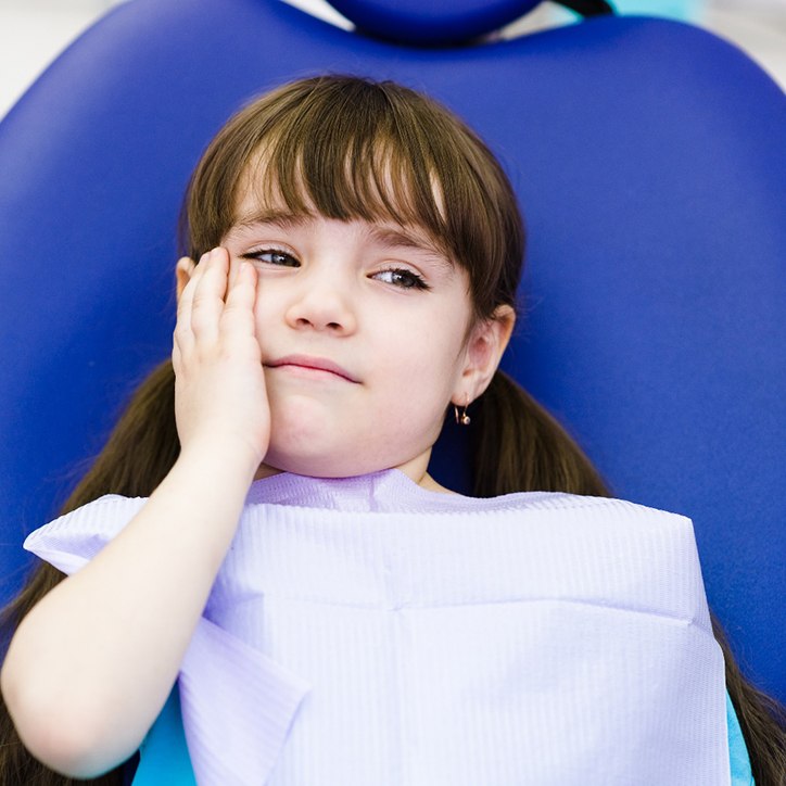 Boy smiling in dental chair