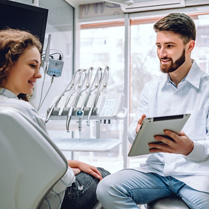 Woman at dentist for teeth whitening in Long Beach